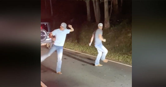 Watch Two Guys Line Dance in the Road While Stuck in Gatlinburg Traffic