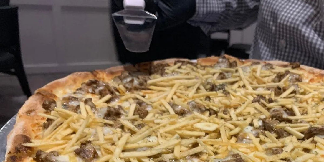 pizza with beef and shoestring potatoes at pizzario in pigeon forge tn