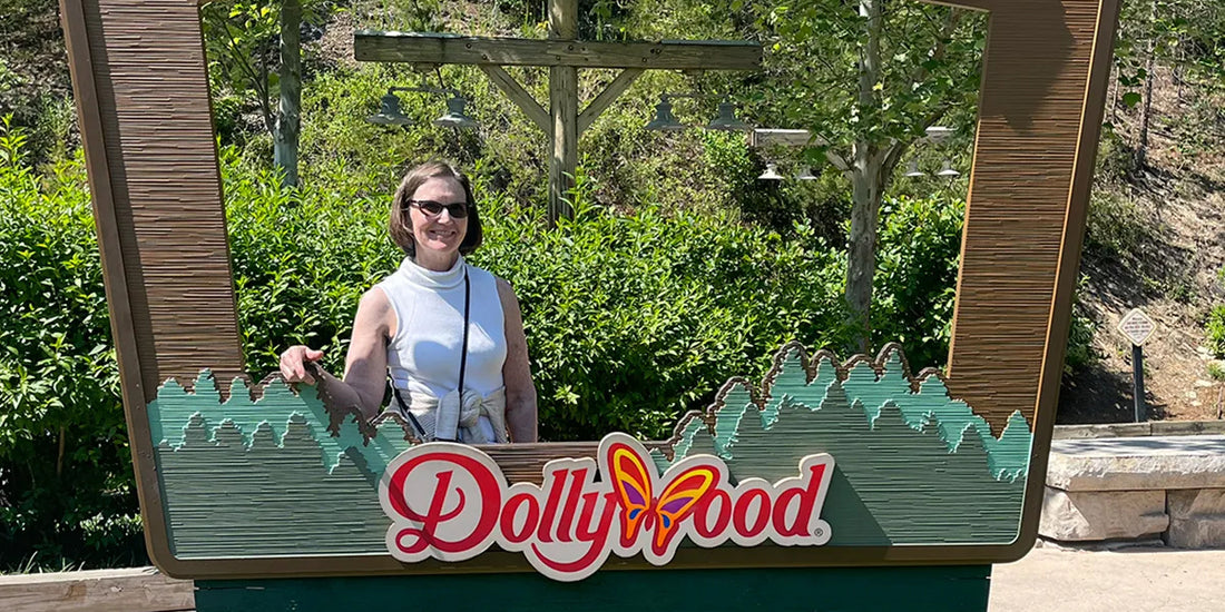 A woman poses for a photo op at Dollywood in Pigeon Forge